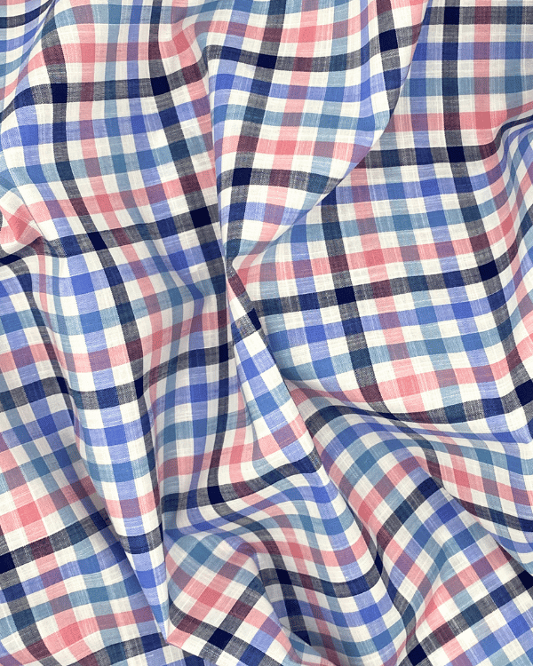 White Blue Pink Multi Color Cotton Slub Plaid Fabric 58WBrighten your sewing with our multi-color cotton slub plaid! At 58" wide, it's perfect for vibrant dresses or chic button-ups.Threadymade