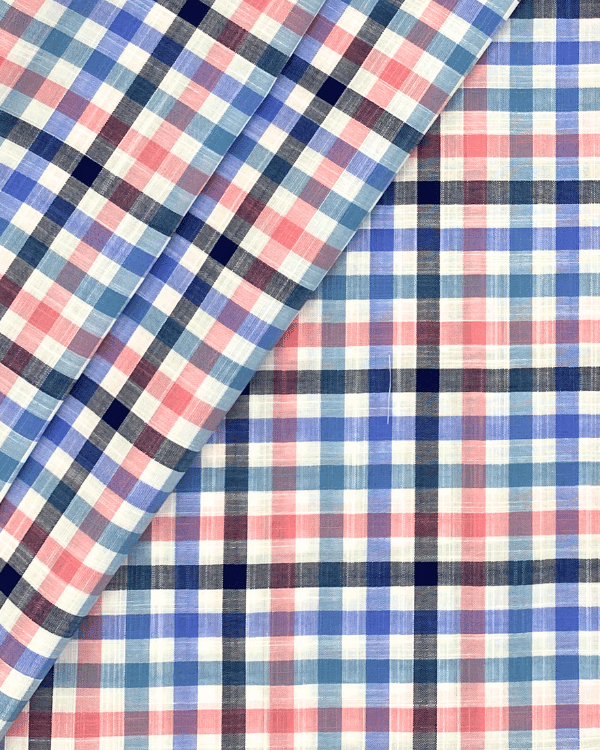 White Blue Pink Multi Color Cotton Slub Plaid Fabric 58WBrighten your sewing with our multi-color cotton slub plaid! At 58" wide, it's perfect for vibrant dresses or chic button-ups.Threadymade