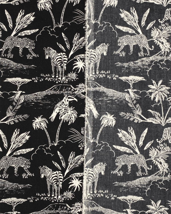 Black White Jungle Safari Toile De Jouy Fabric | Cotton 58"W | Photo of fabric folded to show face side and back side of material