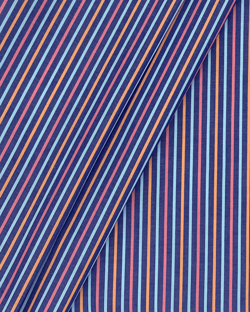 Multicolor yarn-dyed striped cotton fabric in blue, pink, and orange