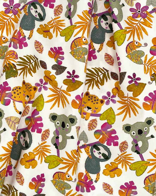 Draped view of jungle animal cotton fabric with sloths, koalas, leopards, and tropical leaves on a white background