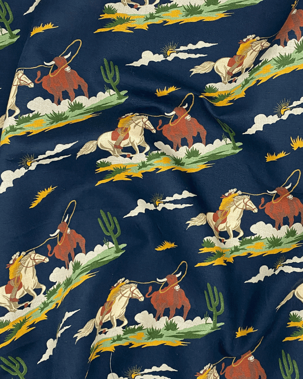 Western cowboy cotton fabric with horses and longhorns – navy background