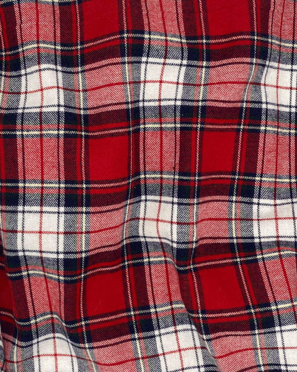 Red brushed cotton flannel fabric in plaid check, draped to show texture