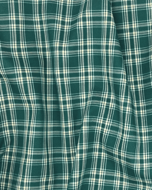 Teal green check cotton fabric close-up weave shown draped