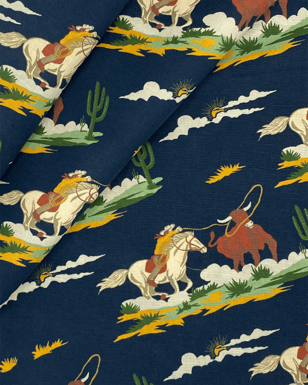 Vintage cowboy cotton slub fabric – folded yardage close-up