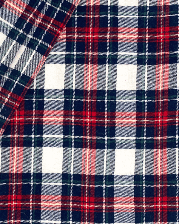 Folded red navy green tartan cotton flannel fabric