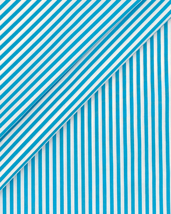 Folded sky blue stripe yarn-dyed cotton fabric close-up