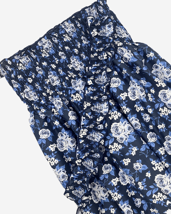 Pre-shirred navy floral cotton fabric for children’s dresses, skirts, and tops.