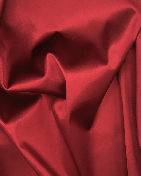 Dark Red Stretch Satin Fabric | Polyester Spandex 40WWhy settle for ordinary when you can have Pink Stretch Satin Crepe? This fabulous fabric combines the elegance of satin with the free-spirited vibe of crepe, making it your go-to for everything from gla