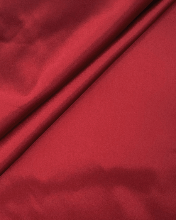 Dark Red Stretch Satin Fabric | Polyester Spandex 40WWhy settle for ordinary when you can have Pink Stretch Satin Crepe? This fabulous fabric combines the elegance of satin with the free-spirited vibe of crepe, making it your go-to for everything from gla