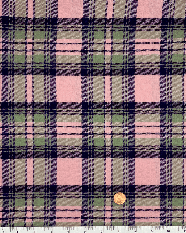 Pink and green plaid cotton fabric with ruler for scale