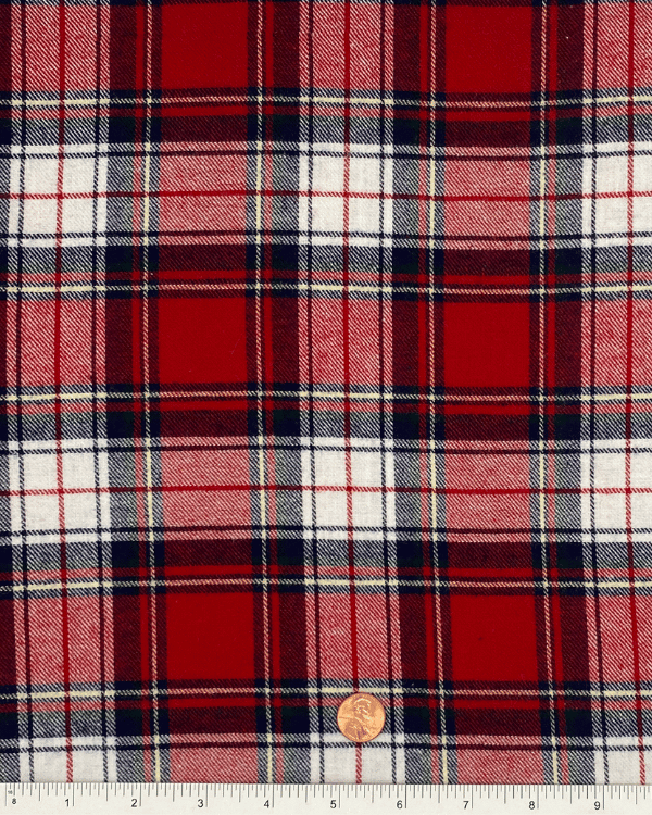 Classic red plaid cotton flannel with penny and ruler for scale