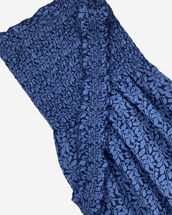 Close-up of pre-shirred blue leaf fabric for sundresses and tops