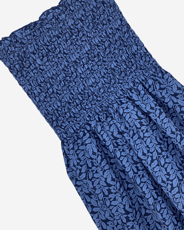 Smocked blue leaf cotton fabric by the yard with shirring detail shown flat