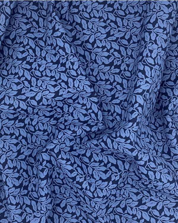 Vintage-inspired indigo blue leaf print cotton shirting, draped view