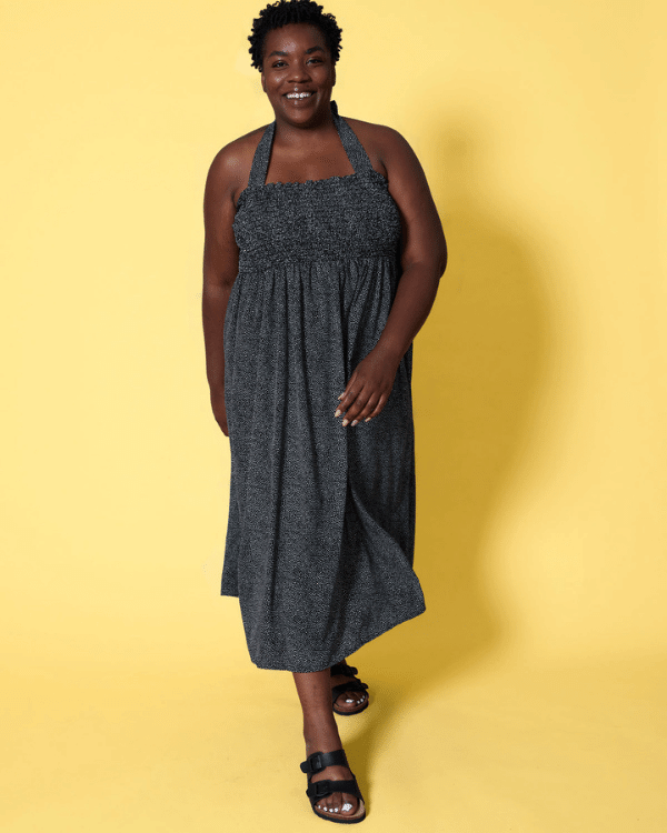 Front View of a Plus Size Model wearing Black and White Pebble Polka Dot Shirred Halter Dress made from a Threadymade Ready to Sew Shirred Dress Sewing Project Kit